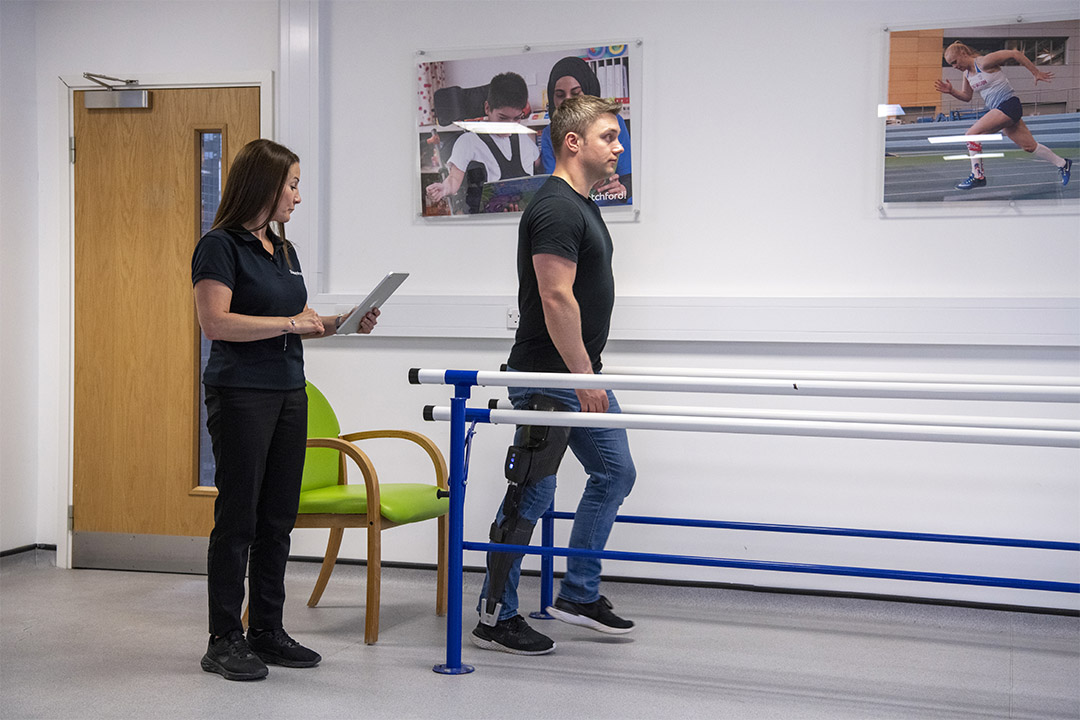 Patient trying out the Tectus KAFO module